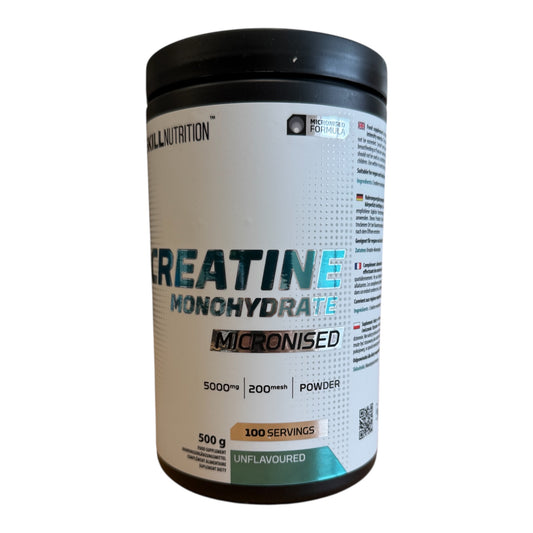 Creatine monohydrate powder container with black lid on a white background