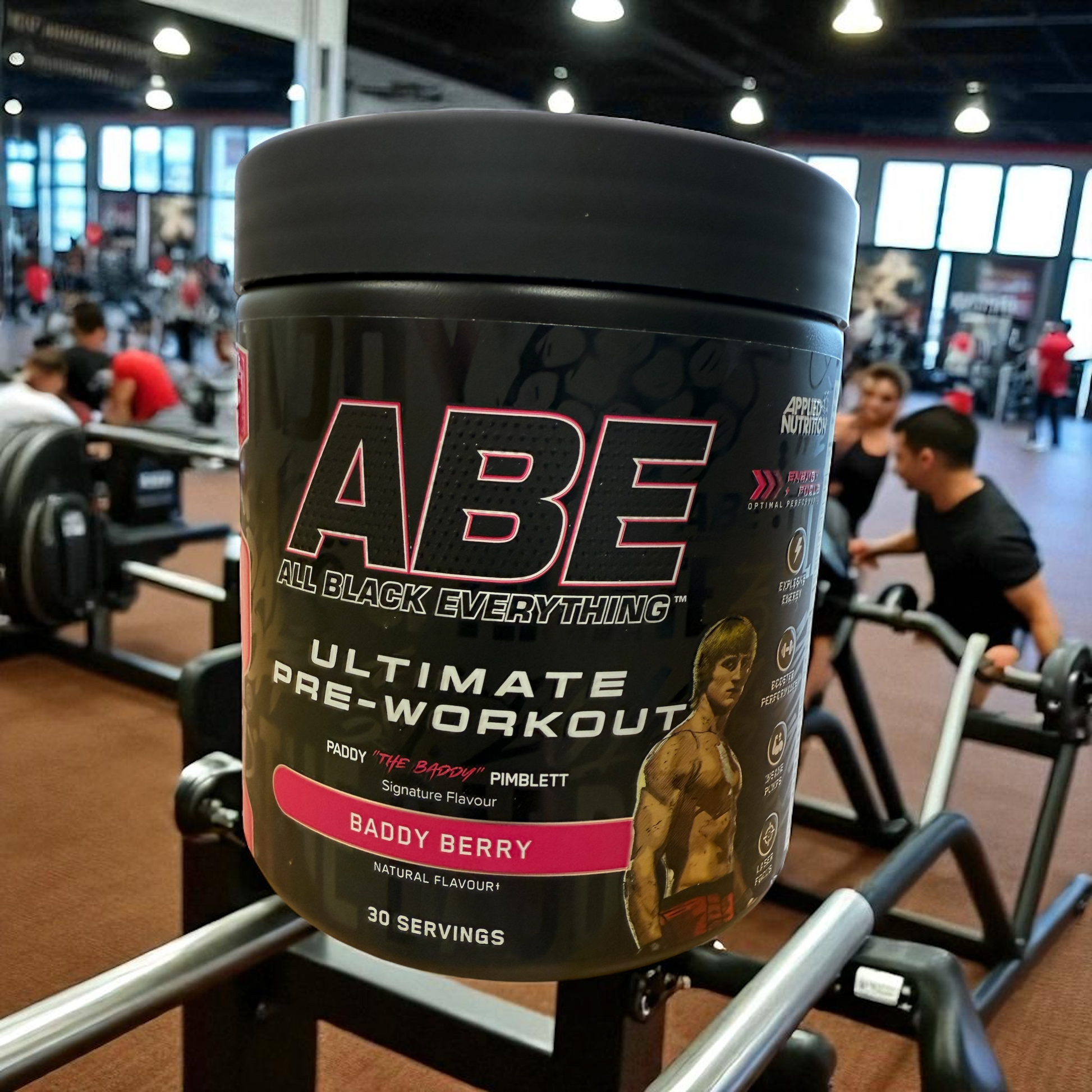 ABE pre-workout supplement container in a gym setting in Baddy Berry flavour