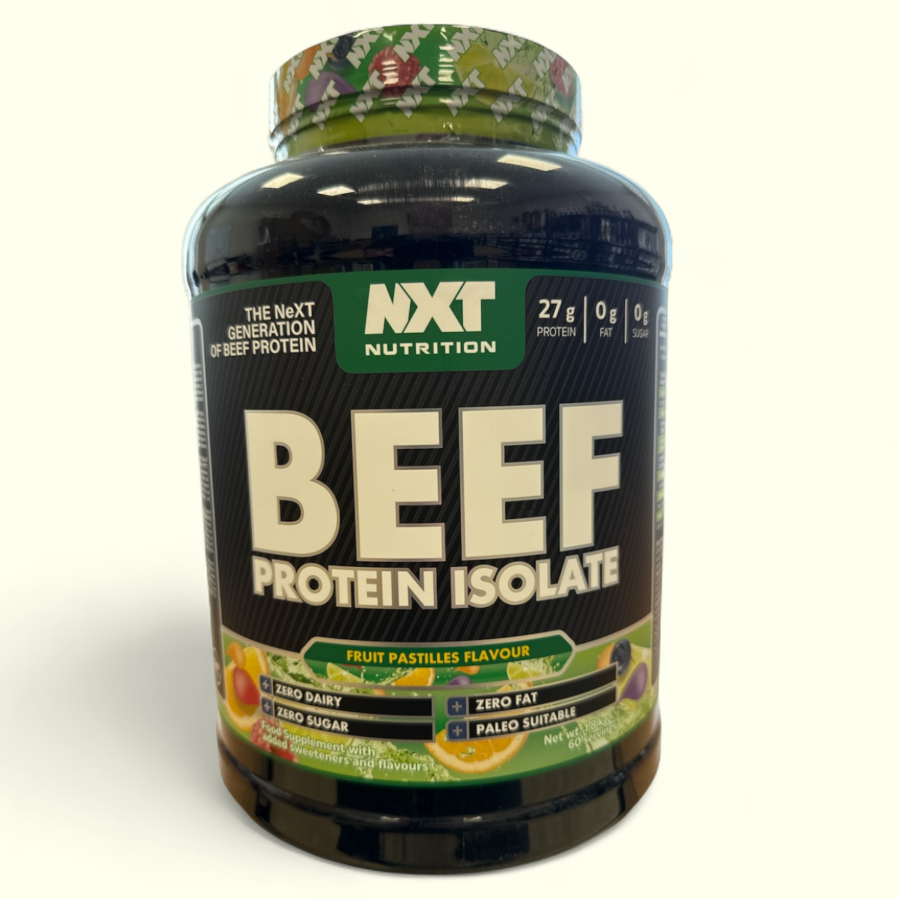 Fruit pastilles flavour Beef protein isolate container with NXT Nutrition branding on a white background