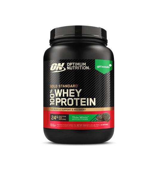 Optimum Nutrition Gold Standard 100% Whey Protein container on a green background