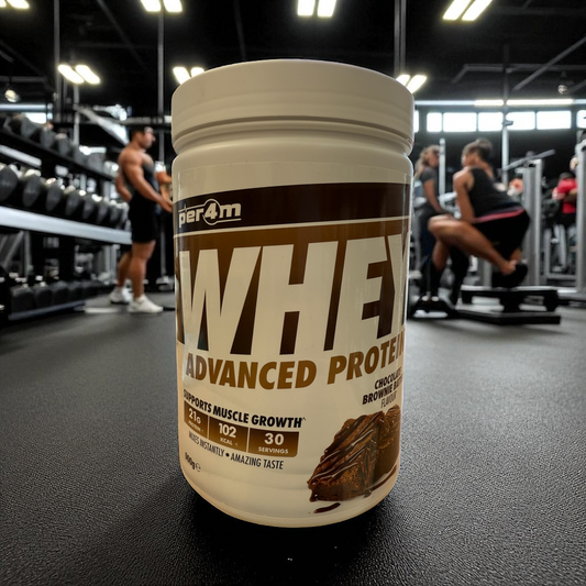 Whey protein supplement container in a gym setting